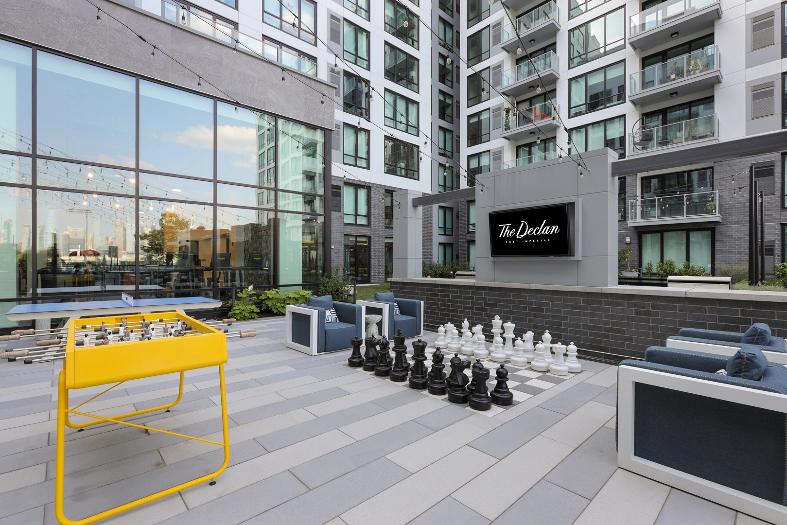 TheDeclan_Amenity_OutdoorChess_Shoootin_June2025